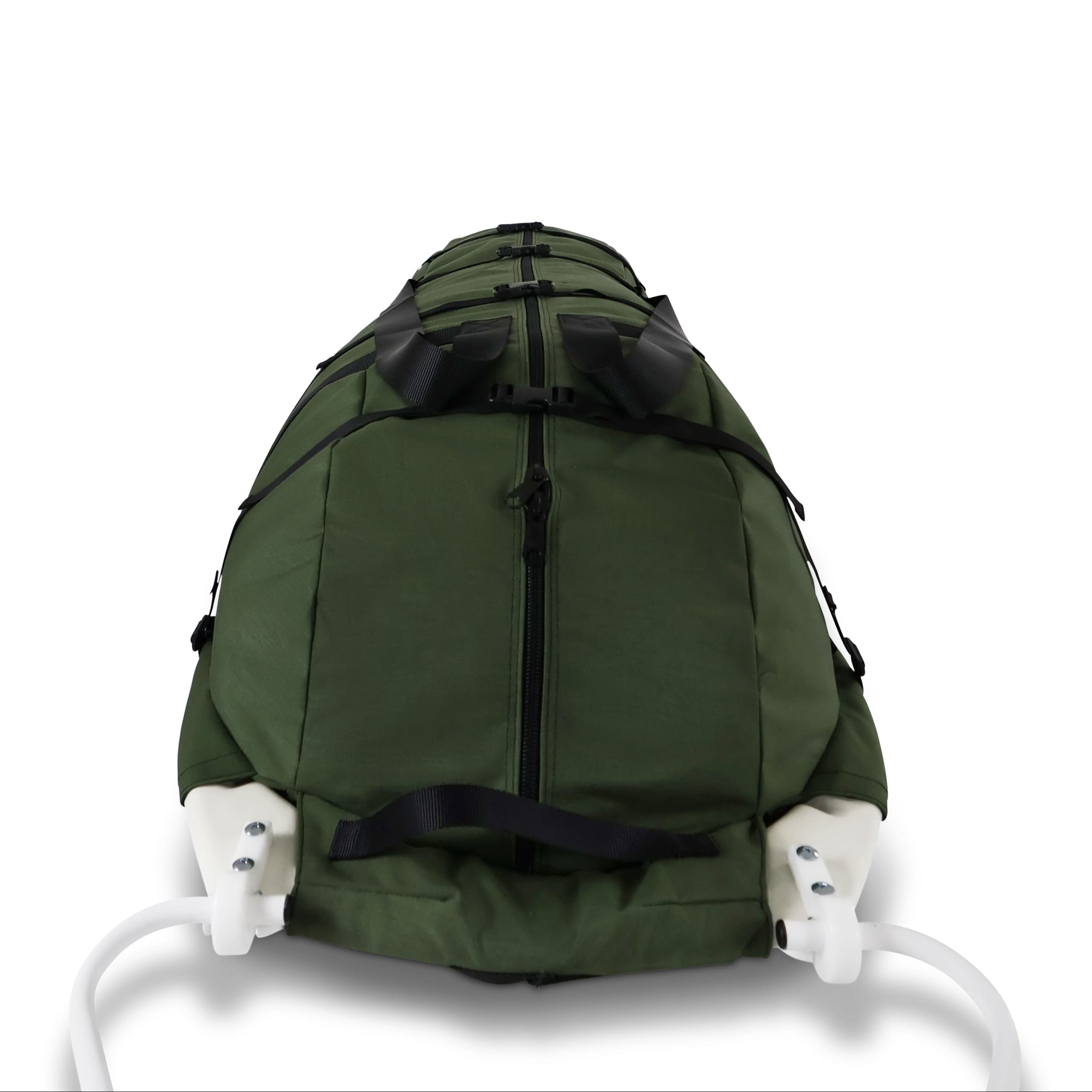 A Olive green snowmobile pulk sled cargo bag with black straps and a white plastic sled base, shown on a clean white background. A black label on the front displays the brand 'Wilderness Engineering'.