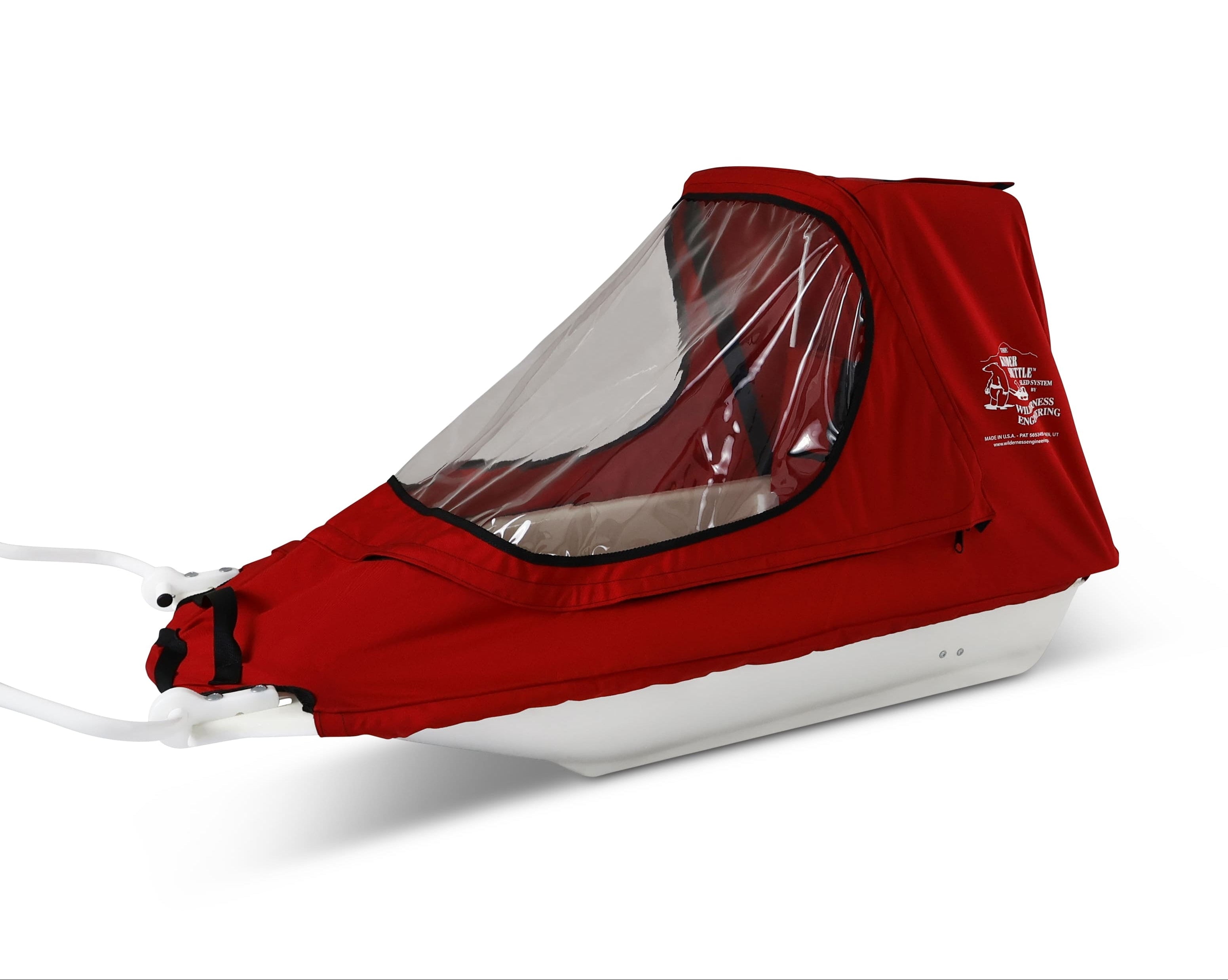 A red KinderShuttle Pulk canopy with a clear plastic window, shown on a white sled against a plain white background.
