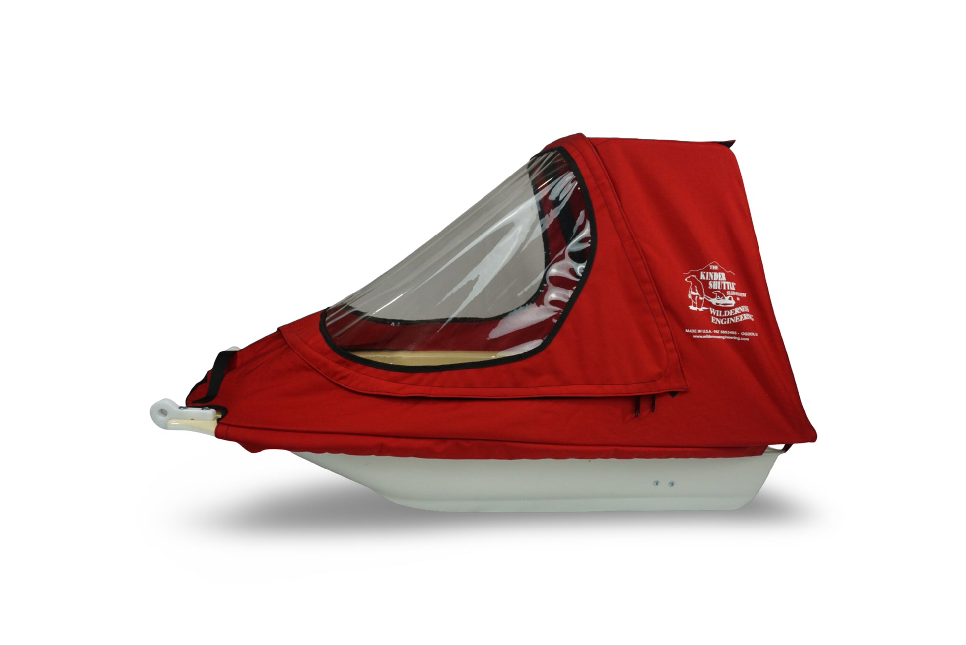 Side view of KinderShuttle sled highlighting hull depth and canopy shape