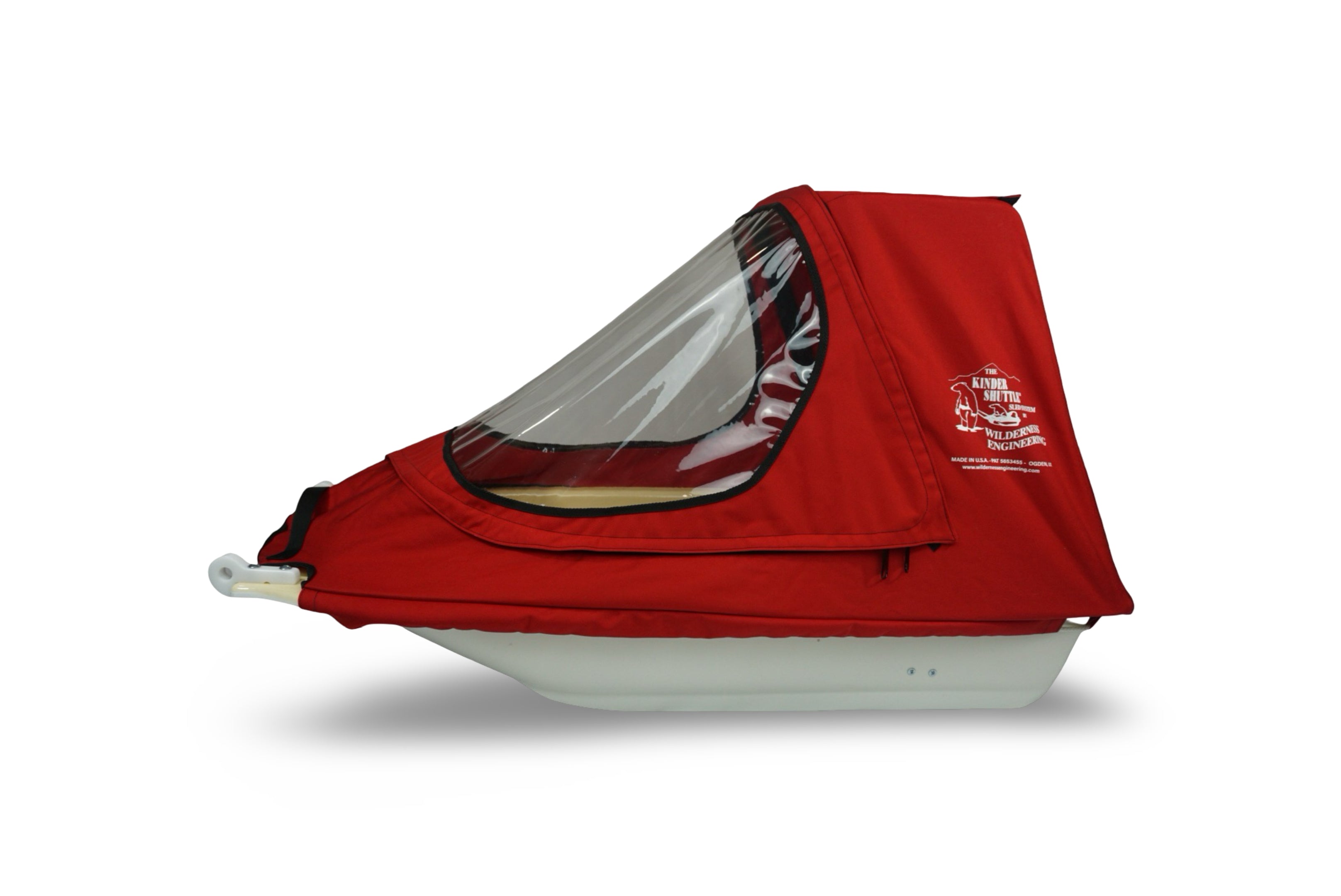 Side view of KinderShuttle sled highlighting hull depth and canopy shape